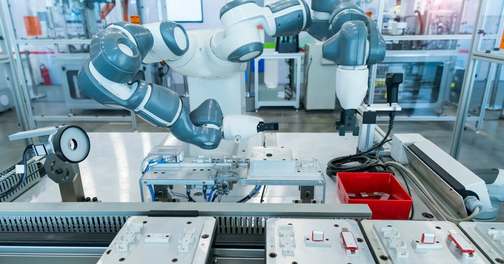 Robot arms in an Industry 4.0 factory