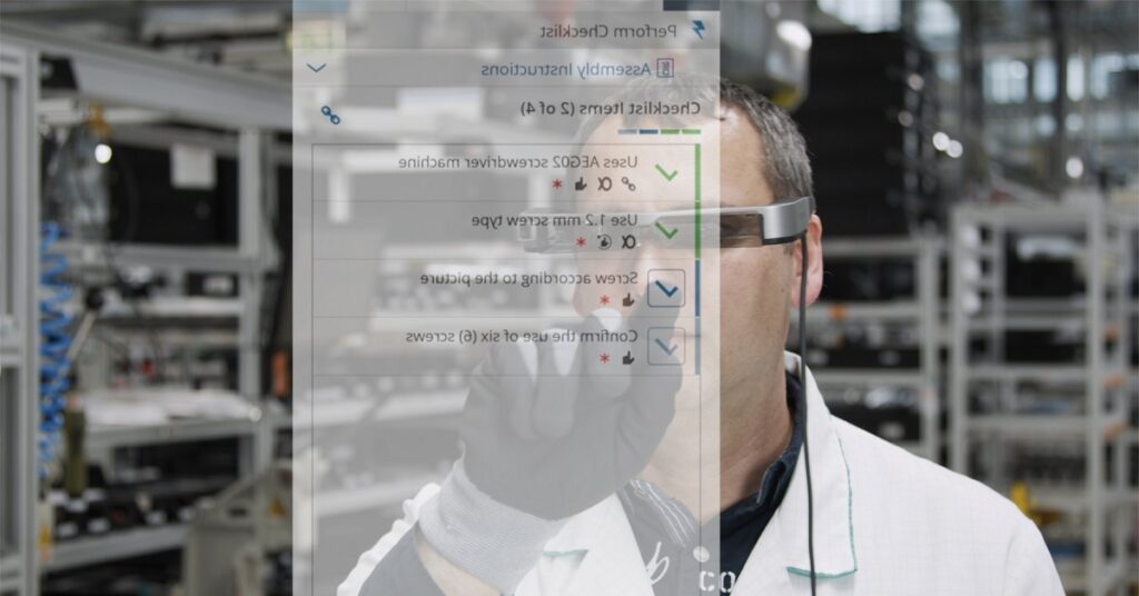 SMT Technician working on MES using Augmented Reality glasses