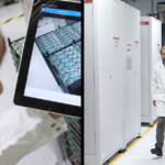 Two separate images depicting men wearing lab coats, highlighting the concept of Human Digitalization in a laboratory setting.