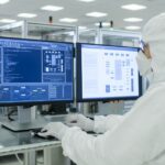 Scientists-in-Sterile-Suits-Working-with-Computers-Analyzing-Data-Semiconductors