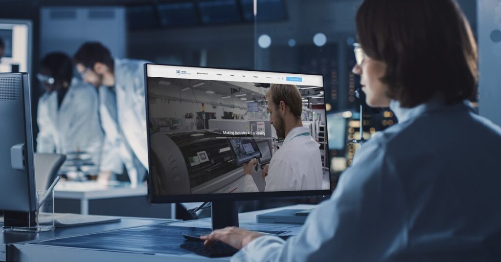 Woman looking at "Making Industry 4.0 a Reality" article of Critical Manufacturing, in a Electronics lab.