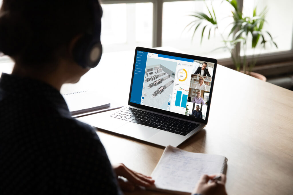 Participant of a online meeting capturing key points in a training program.